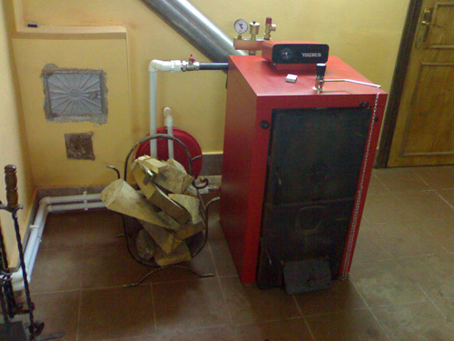 Котлы отопления на твердом топливе: виды твердотопливного оборудования
